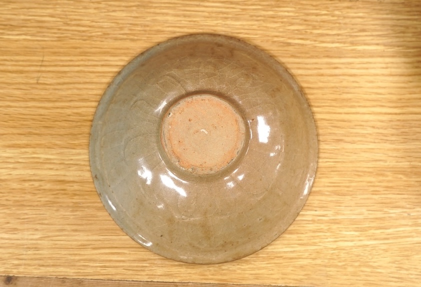 Five pieces of Chinese/Korean celadon comprising three bowls and two vases, 31cm high. Condition - some breaks